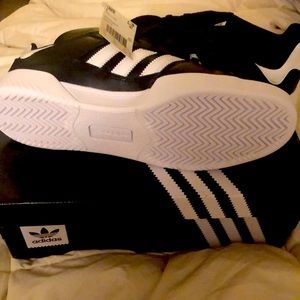 Brand new size 10 adidas